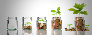 Image of money growing in jars