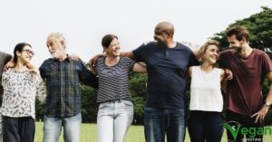 Image of people arm in arm hugging